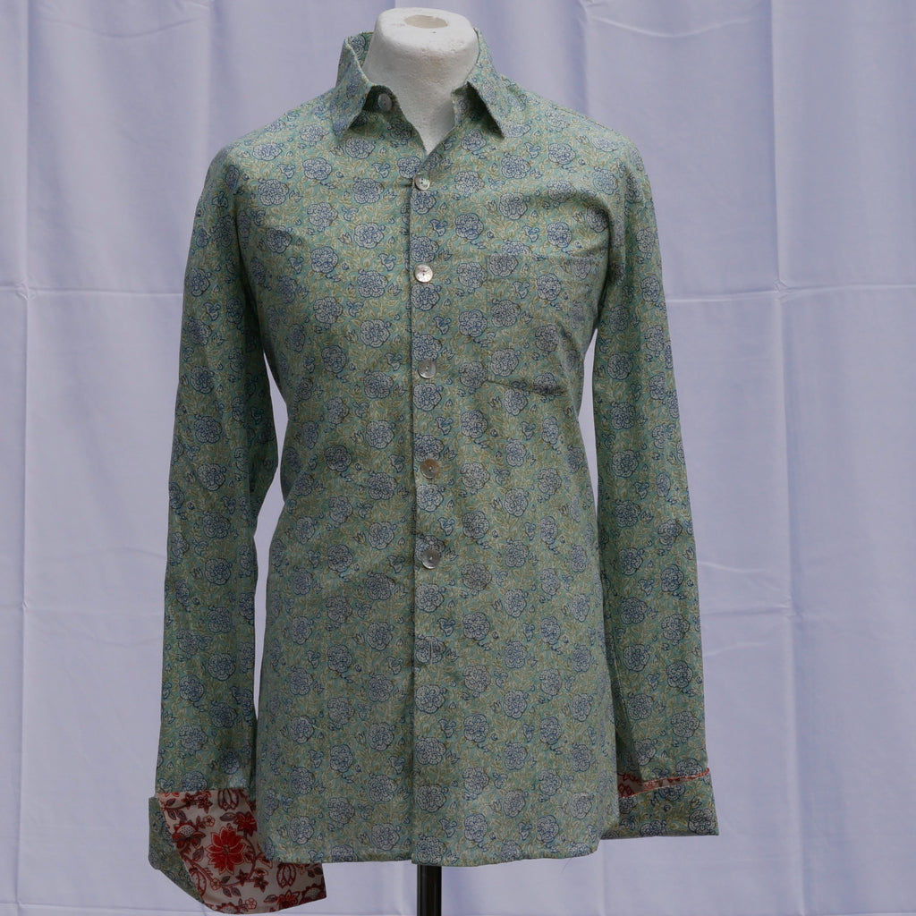 Shirting for men 12 - Blue Hibiscus on green 2019 - End Of Line